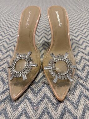 Lemon clear PVC pointed mule with nude trim and crystal burst